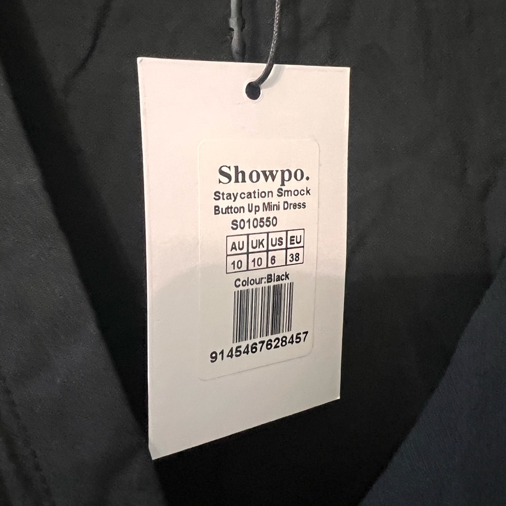 Never worn- tag still on dress.